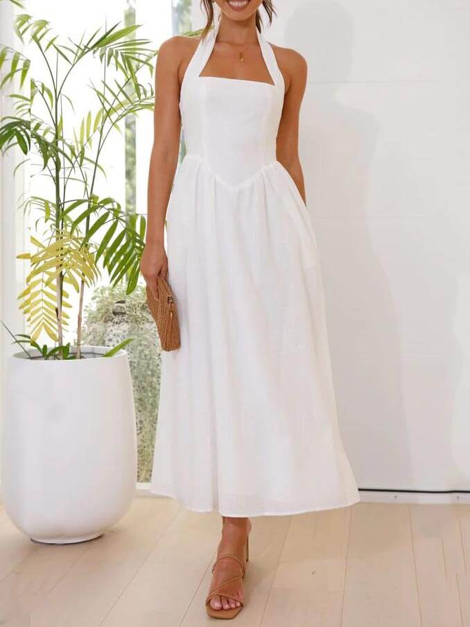 Olga | Vestido midi de gola halter com bolsos laterais