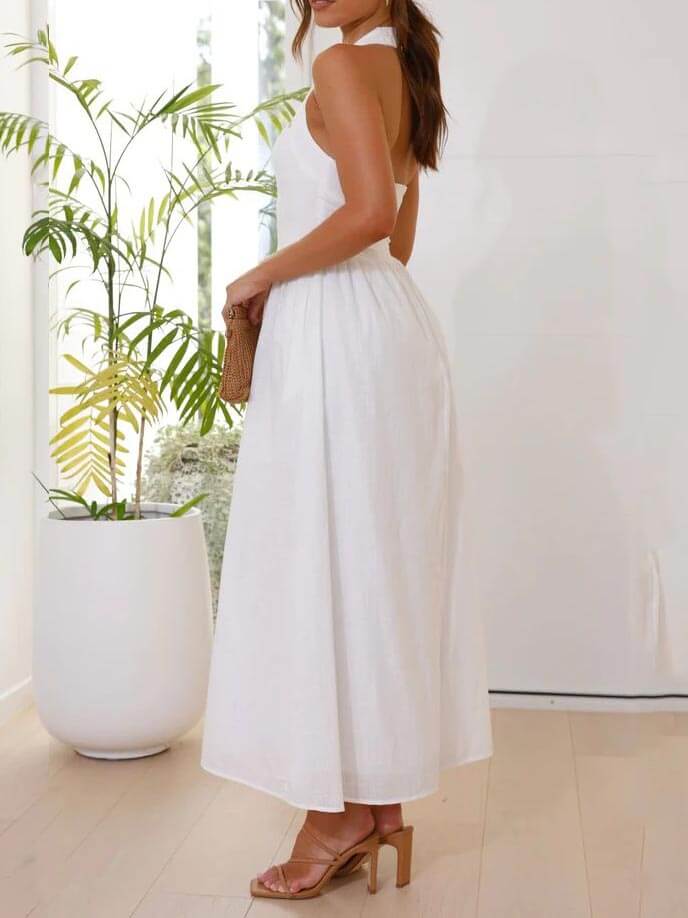Olga | Vestido midi de gola halter com bolsos laterais